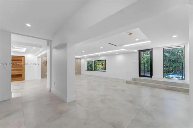 an empty room with windows