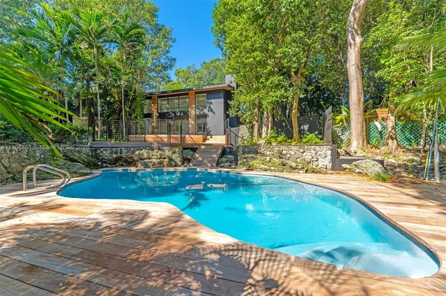 a view of a field with an ocean