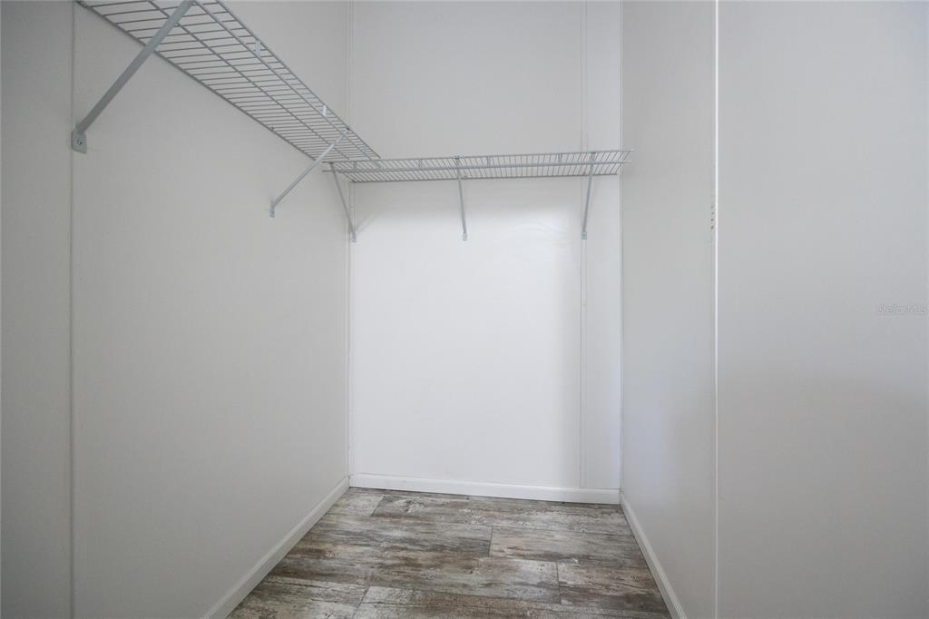 6671 Southwest 128th Lane Lake Butler, FL 32054 - Photo 48 of 66 a view of an empty walk in closet