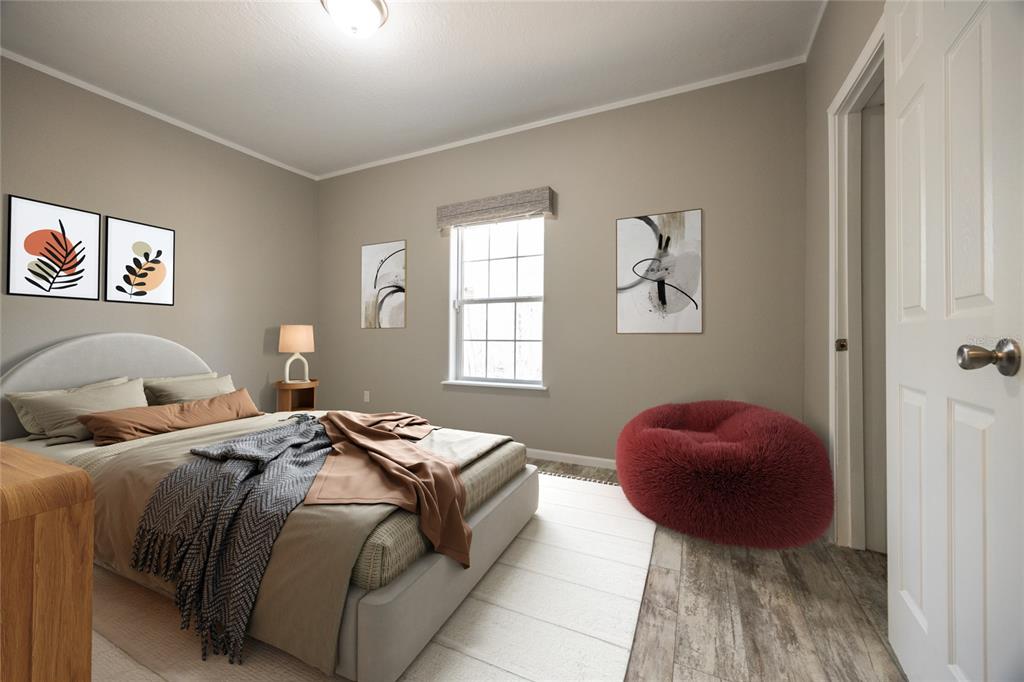 6671 Southwest 128th Lane Lake Butler, FL 32054 - Photo 52 of 66 a bedroom with two beds and a chair