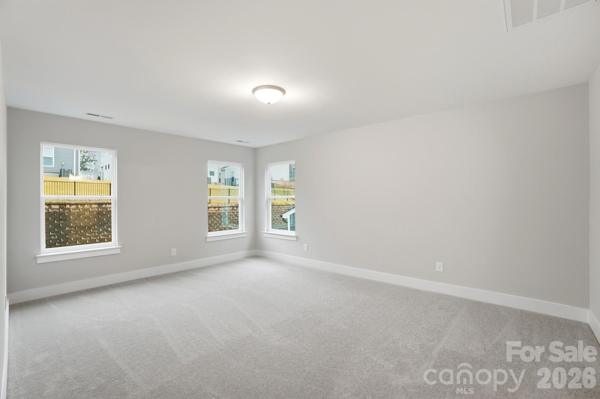 111 Longwood Road Mooresville, NC 28115 - Photo 24 of 47 an empty room with windows