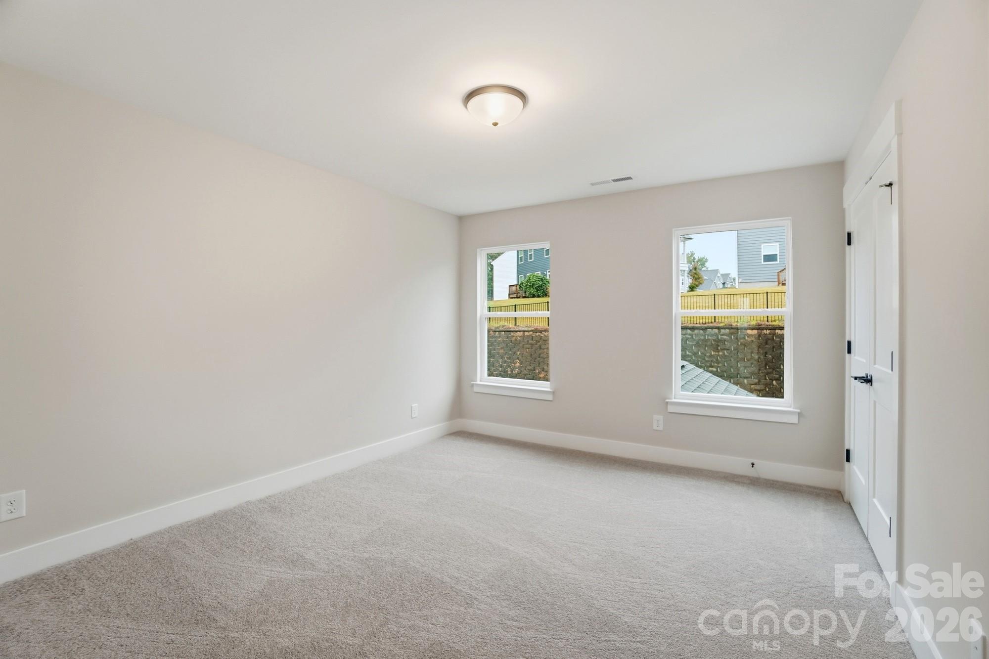 111 Longwood Road Mooresville, NC 28115 - Photo 33 of 47 an empty room with windows