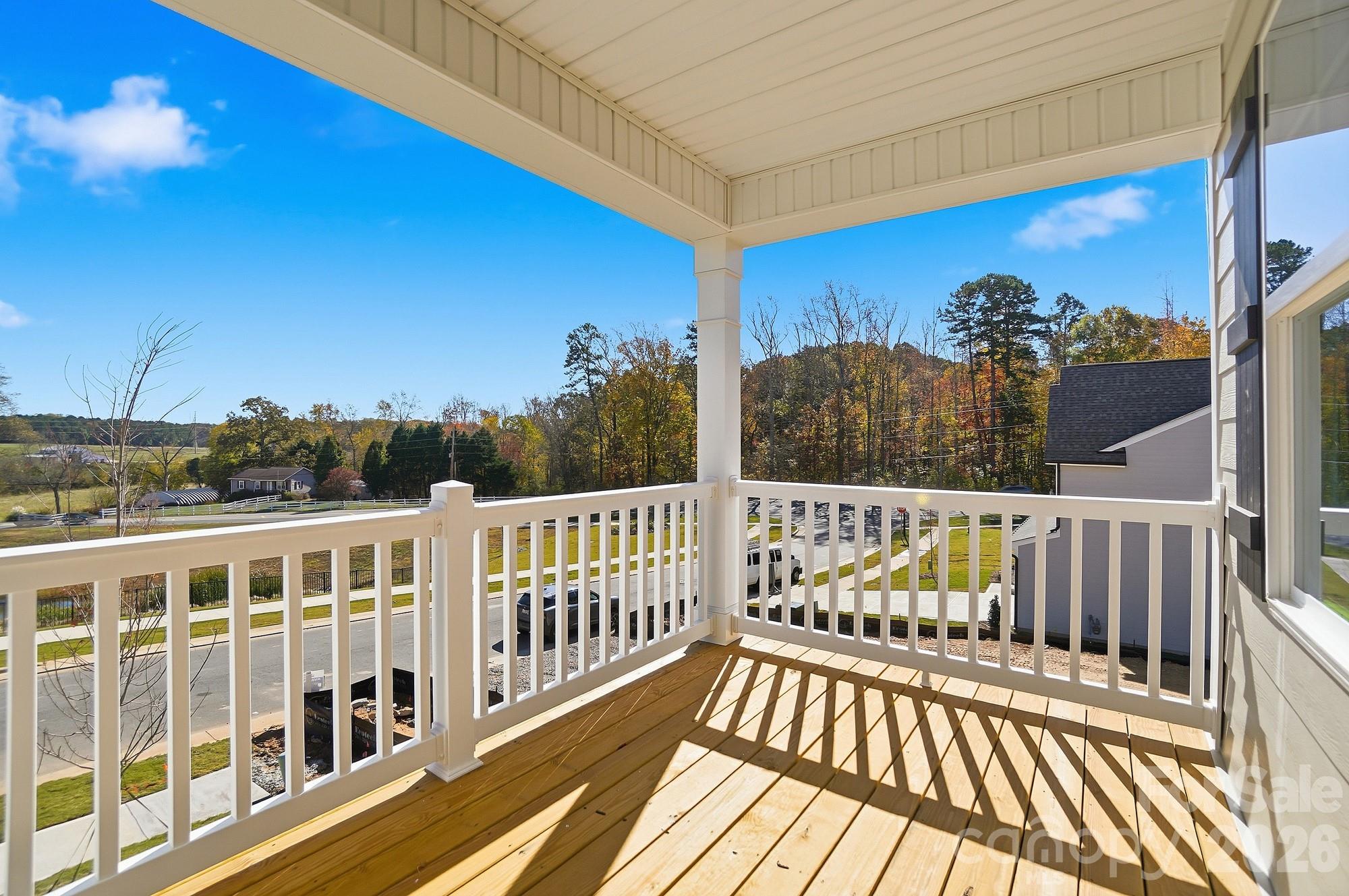 111 Longwood Road Mooresville, NC 28115 - Photo 38 of 47 a view of a balcony with wooden floor