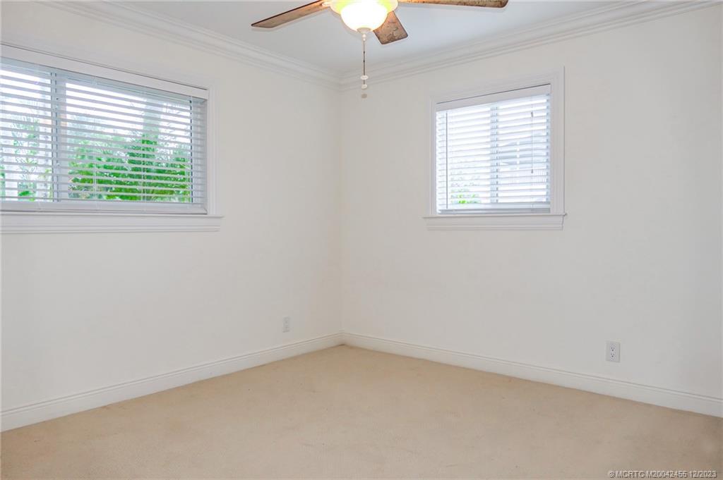 18014 Perigon Way Jupiter, FL 33458 - Photo 31 of 34 an empty room with a window