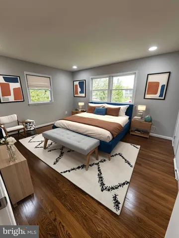 a bed room with furniture and a window