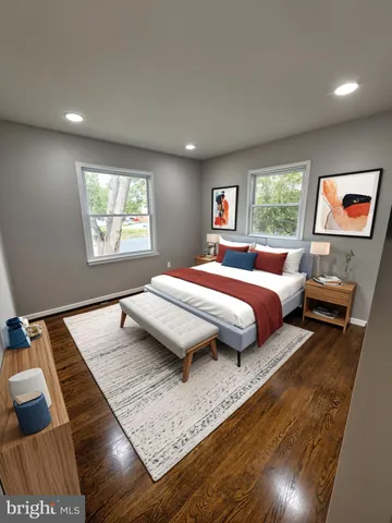 a bedroom with bed and window