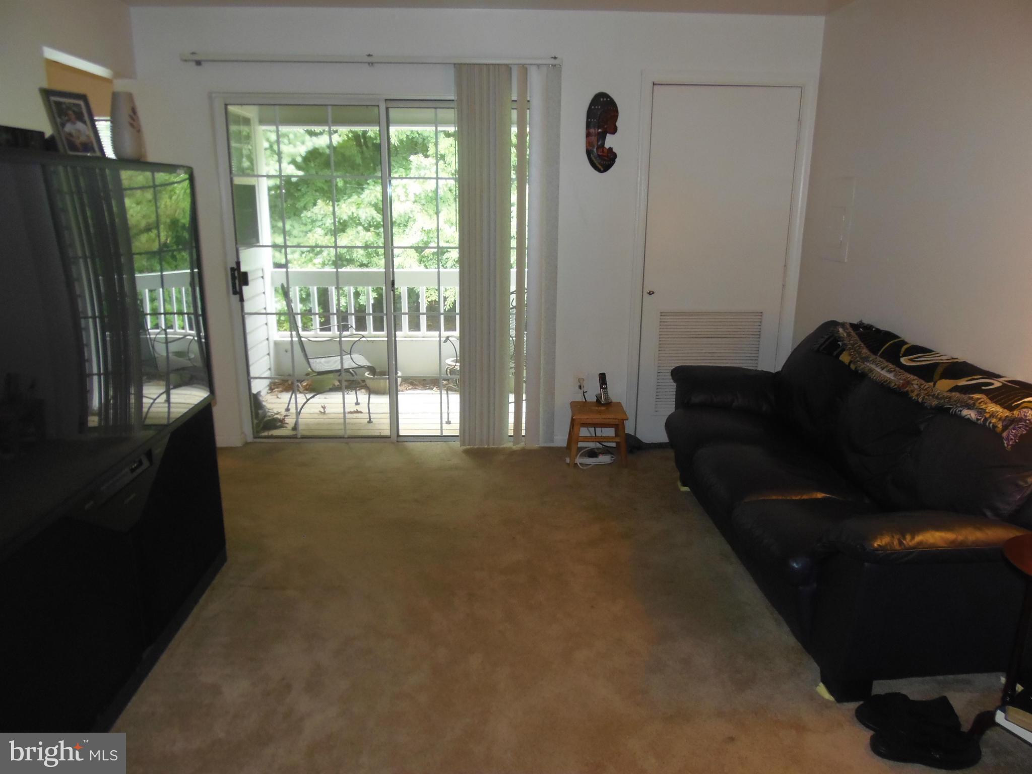 8348 Montgomery Run Road, Unit G Ellicott City, MD 21043 - Photo 12 of 25 Living Room