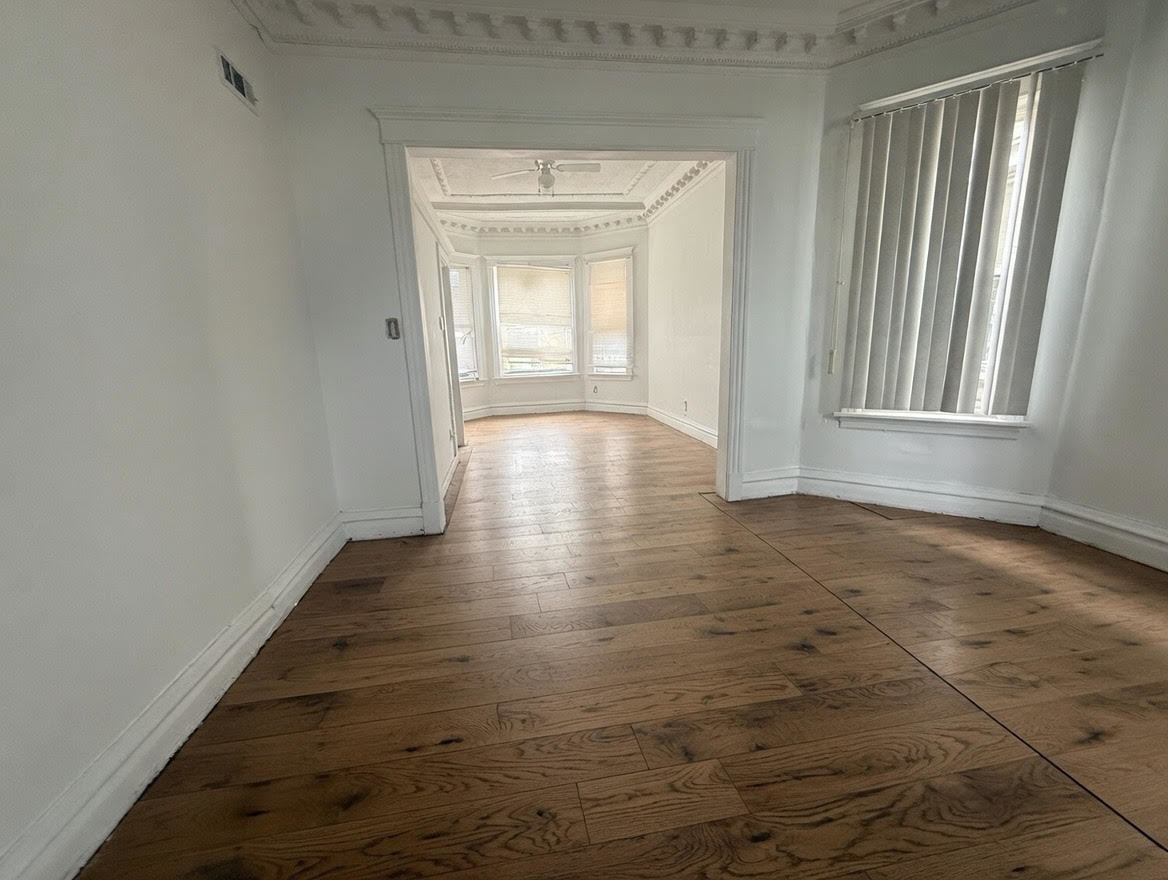 7316 South Perry Avenue Chicago, IL 60621 - Photo 3 of 13 a view of livingroom with window
