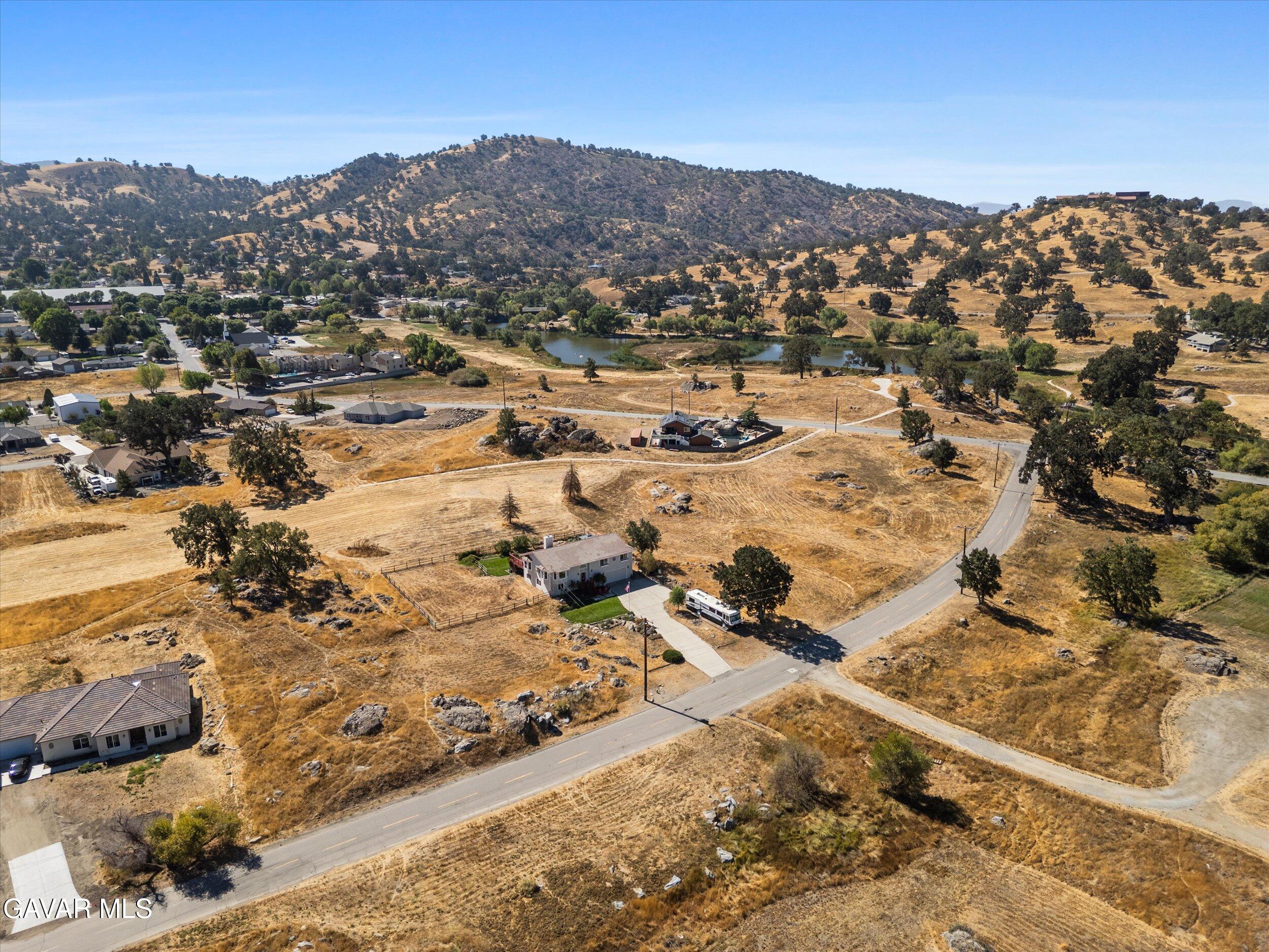 28360 Burning Tree Drive Tehachapi, CA 93561 - Photo 11 of 61 an aerial view of residential house and ocean view