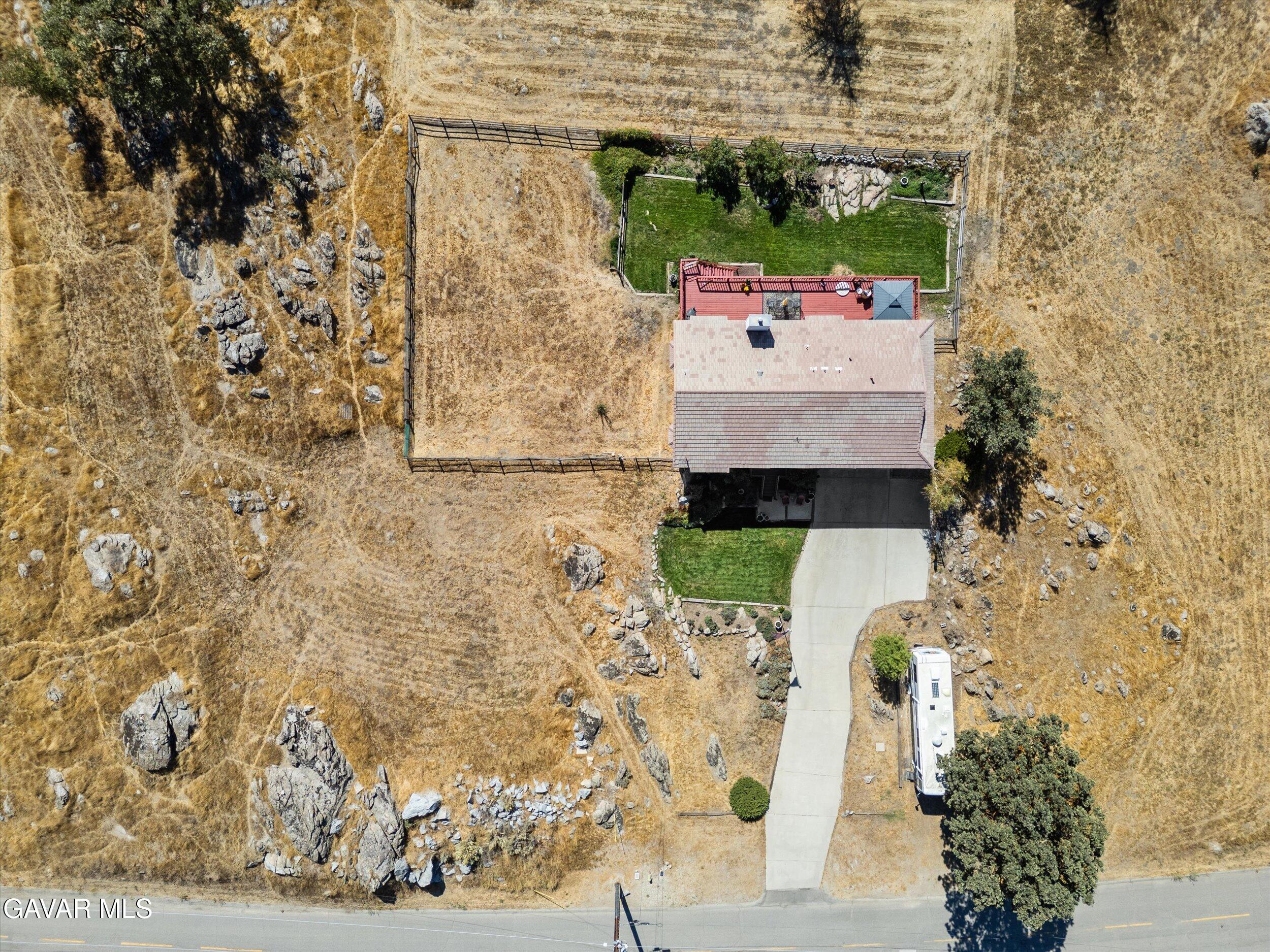 28360 Burning Tree Drive Tehachapi, CA 93561 - Photo 5 of 61 a bathroom with a sink and a mirror