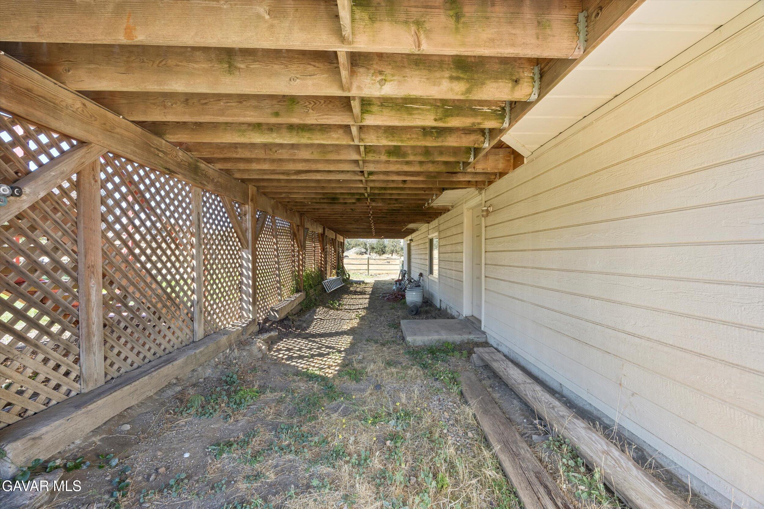 28360 Burning Tree Drive Tehachapi, CA 93561 - Photo 56 of 61 a view of a backyard with pathway