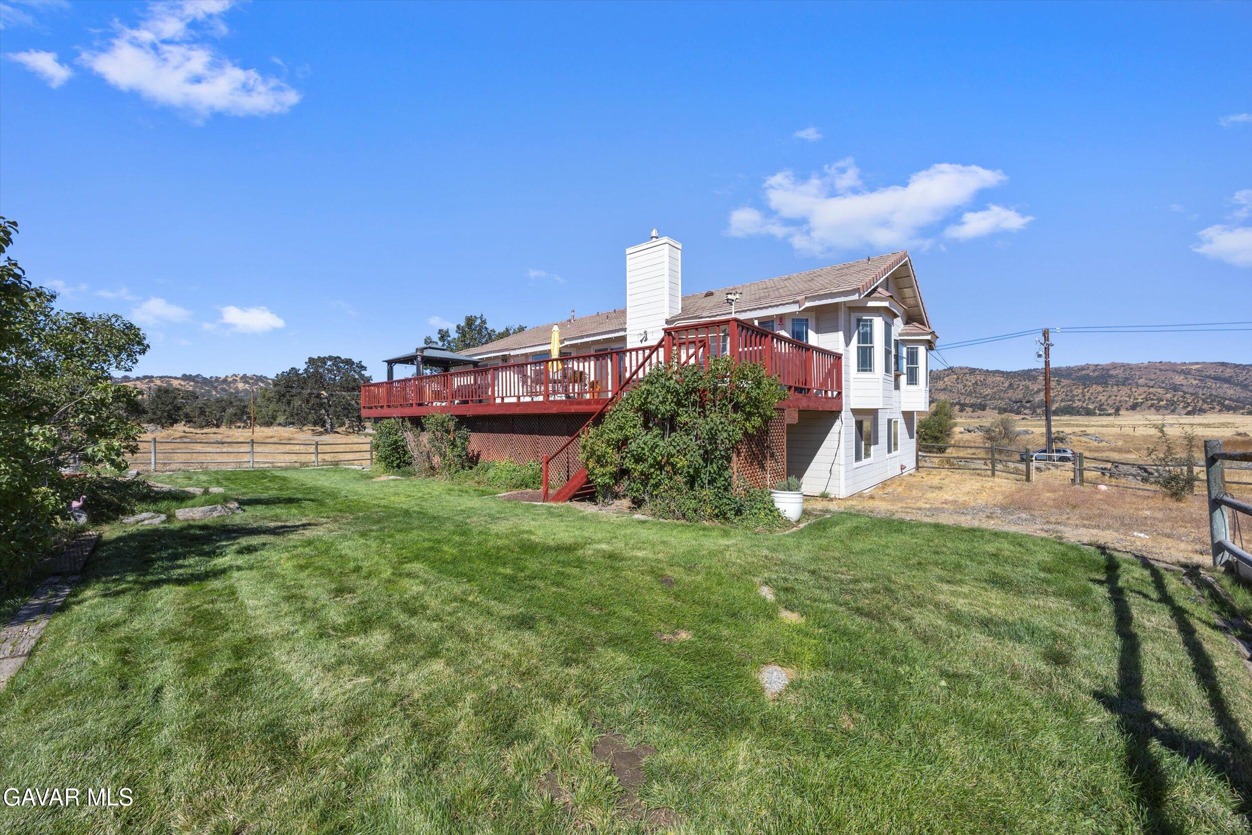 28360 Burning Tree Drive Tehachapi, CA 93561 - Photo 58 of 61 a house view with a garden space