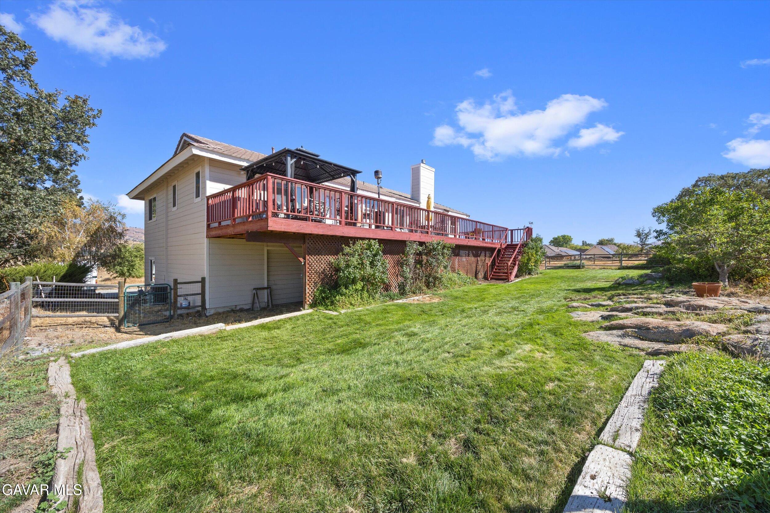 28360 Burning Tree Drive Tehachapi, CA 93561 - Photo 59 of 61 a view of a house with a big yard plants and large trees