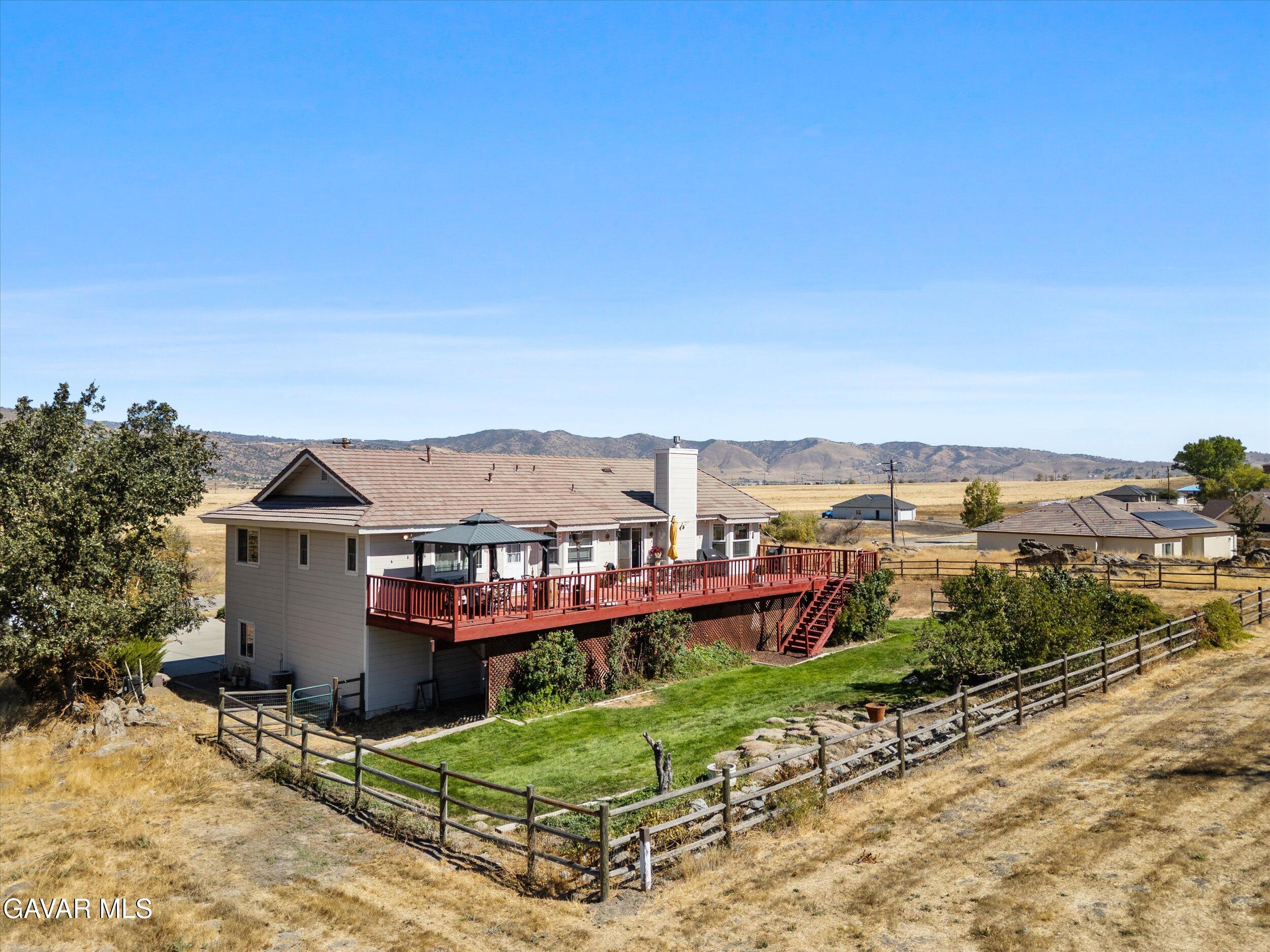 28360 Burning Tree Drive Tehachapi, CA 93561 - Photo 9 of 61 an aerial view of a house with a yard and lake view