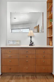 a view with cabinets and wooden floor