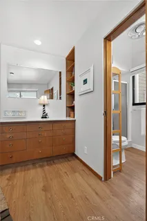 a view of kitchen with wooden floor