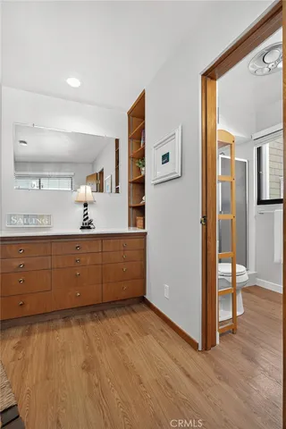 a view of kitchen with wooden floor