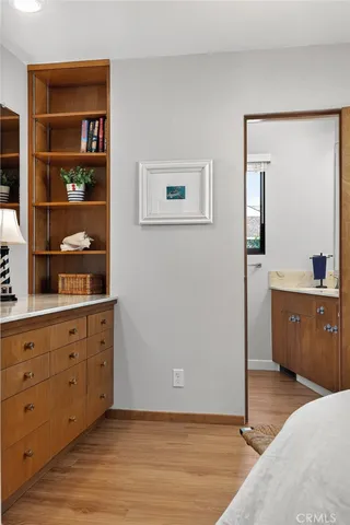 a bathroom with a double vanity sink and mirror