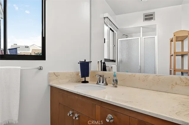 a view of a room with furniture and a fireplace