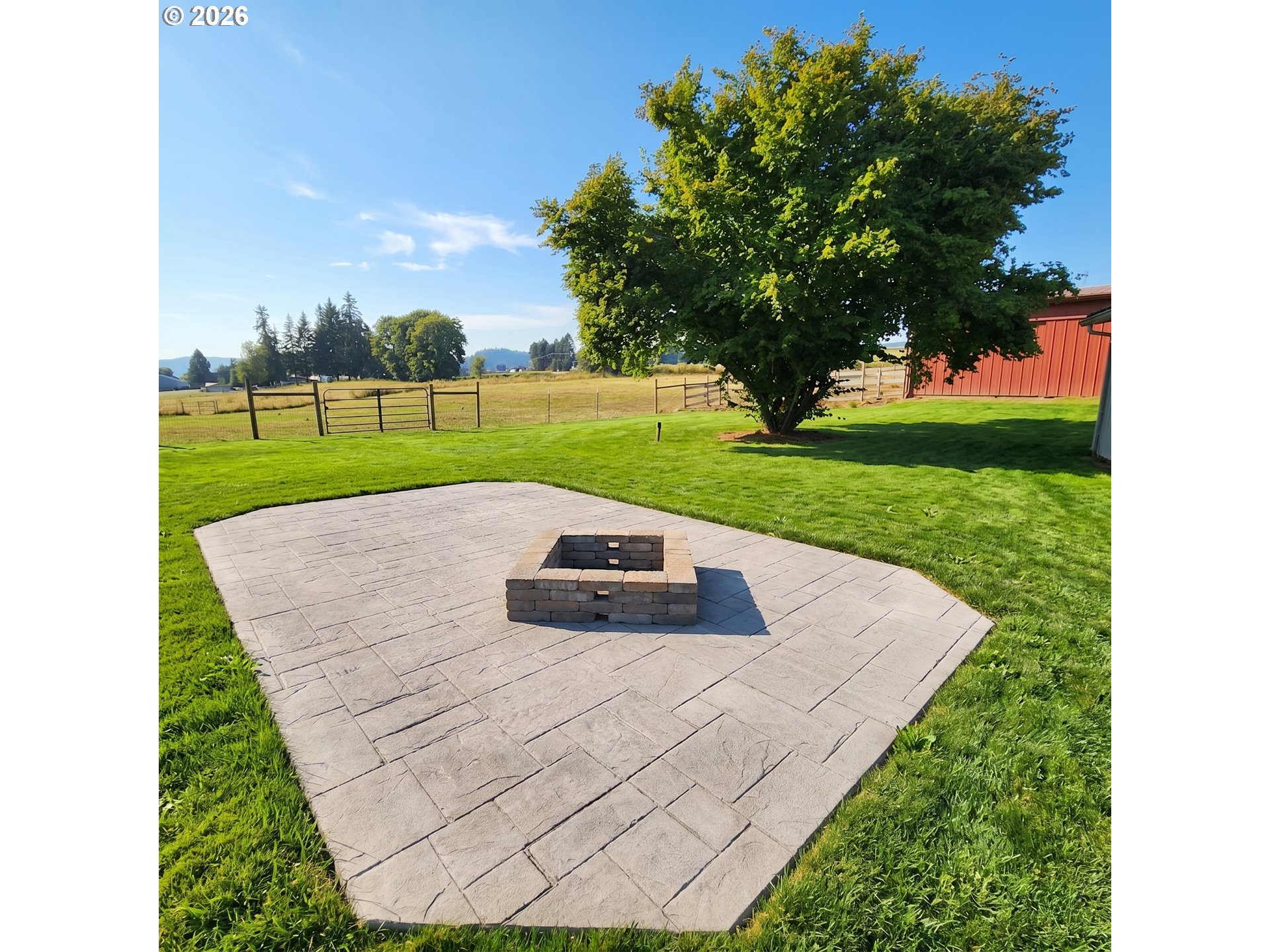 54047 West Lane Road Scappoose, OR 97056 - Photo 29 of 44 a view of a golf course with a garden