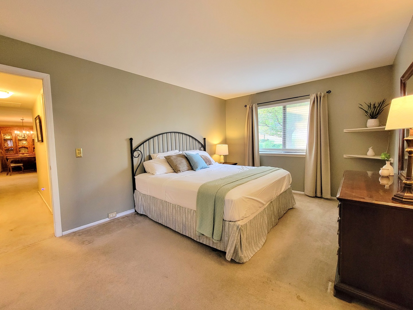 1326 7 Pines Road, Unit D1 Schaumburg, IL 60193 - Photo 14 of 25 a bedroom with a bed chair and window