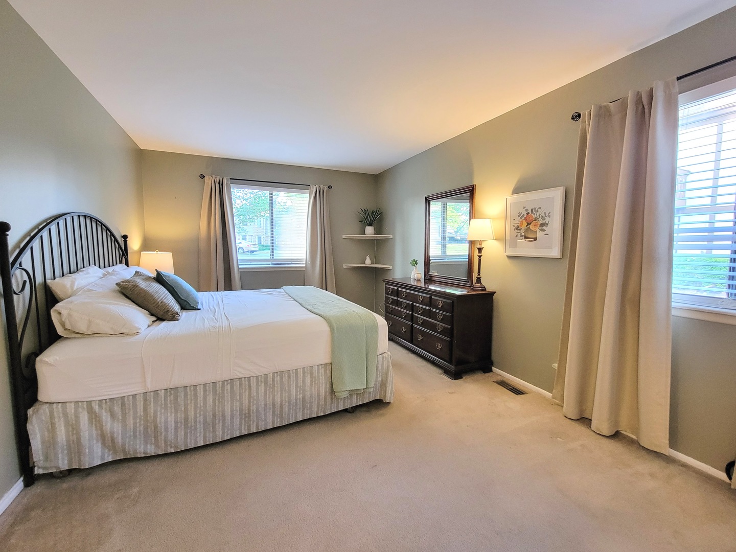 1326 7 Pines Road, Unit D1 Schaumburg, IL 60193 - Photo 15 of 25 a spacious bedroom with a bed and wooden floor