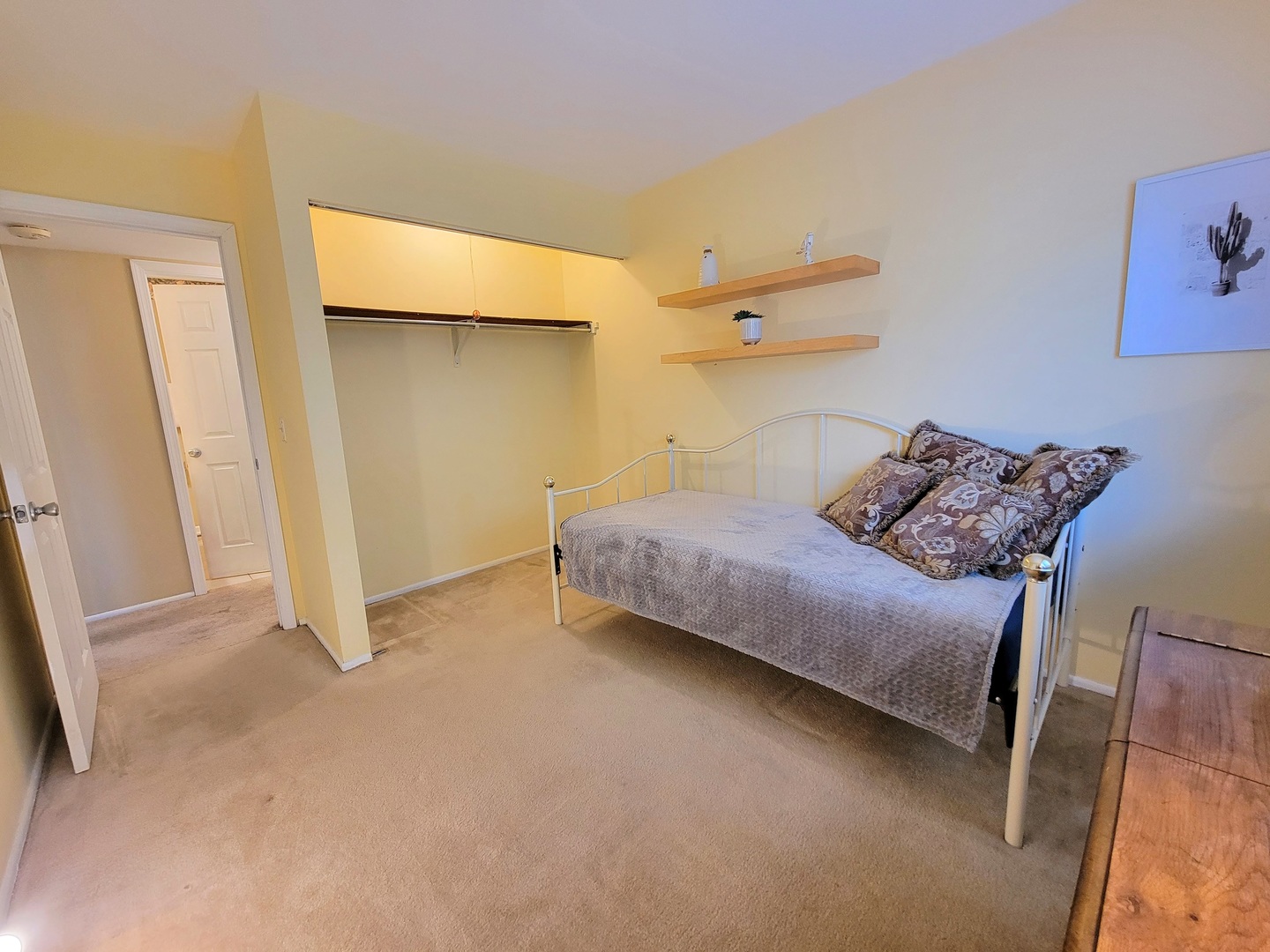 1326 7 Pines Road, Unit D1 Schaumburg, IL 60193 - Photo 20 of 25 a bedroom with a bed and a cabinets