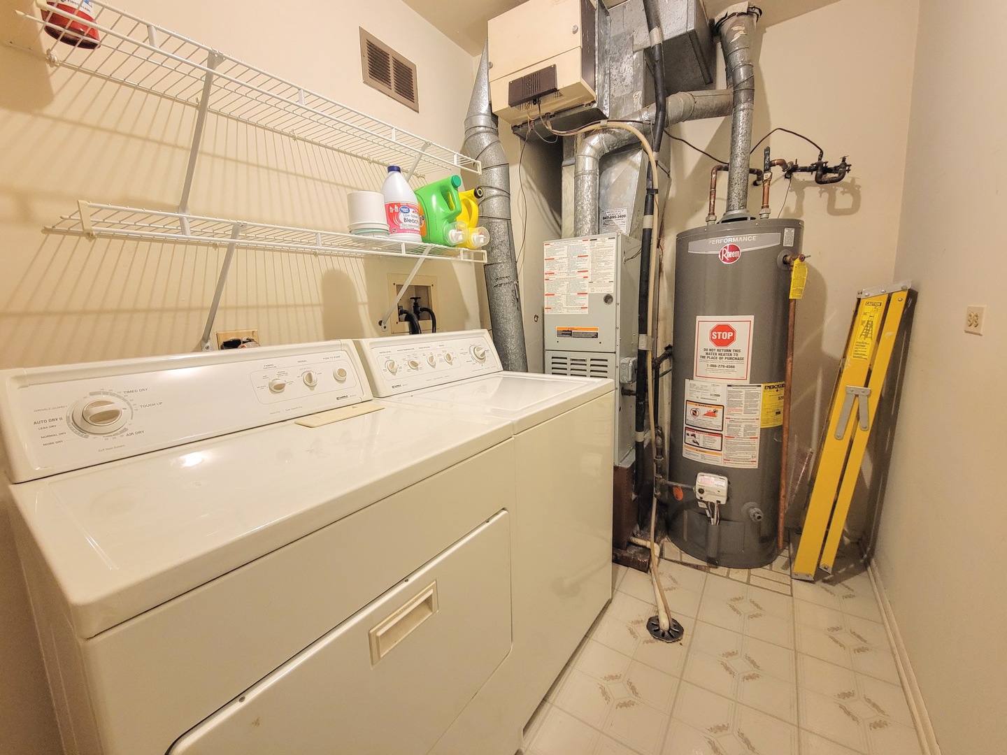 1326 7 Pines Road, Unit D1 Schaumburg, IL 60193 - Photo 23 of 25 a utility room with dryer and washer