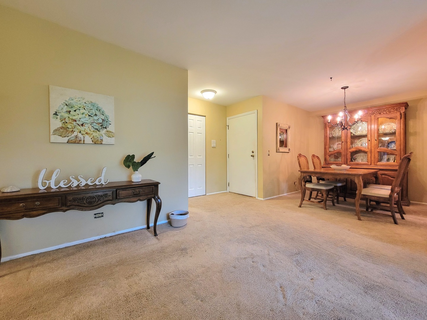 1326 7 Pines Road, Unit D1 Schaumburg, IL 60193 - Photo 6 of 25 a view of a room with chairs and toys