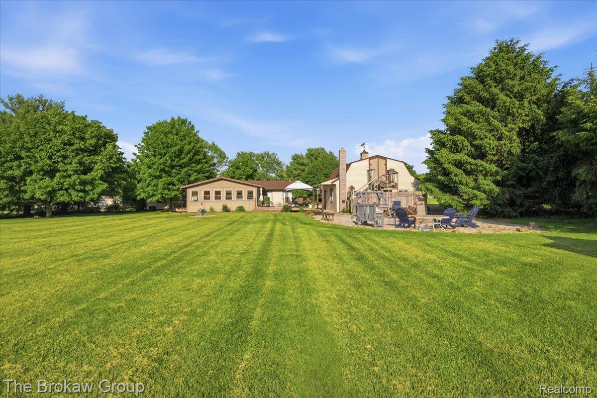 5461 North Henderson Road Davison, MI 48423 - Photo 57 of 64 Expansive lawn area with mature perimeter trees