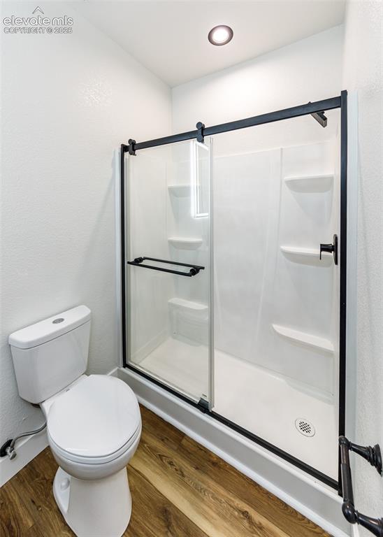 1120 Newton Road Pueblo, CO 81005 - Photo 21 of 46 a bathroom with a toilet and a shower