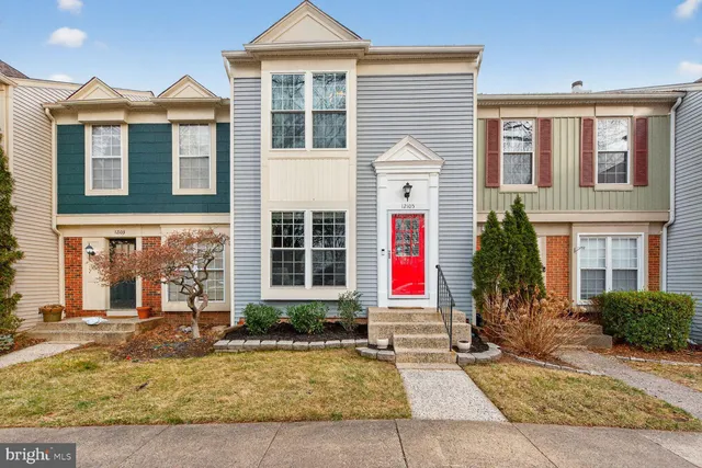 a view of a livingroom with an empty space and a window