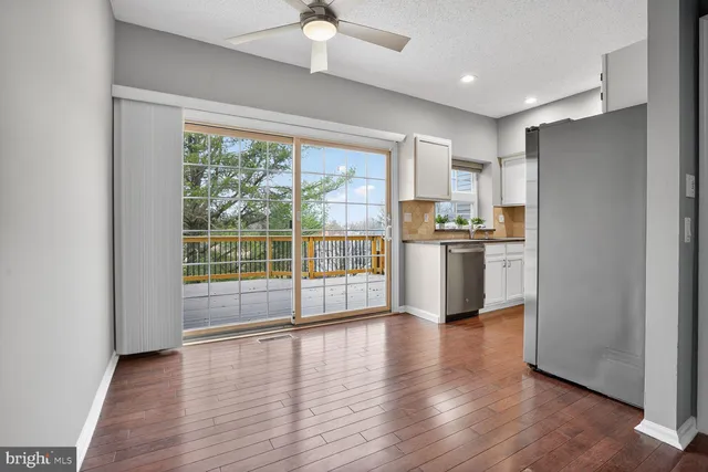a view of street with parked cars