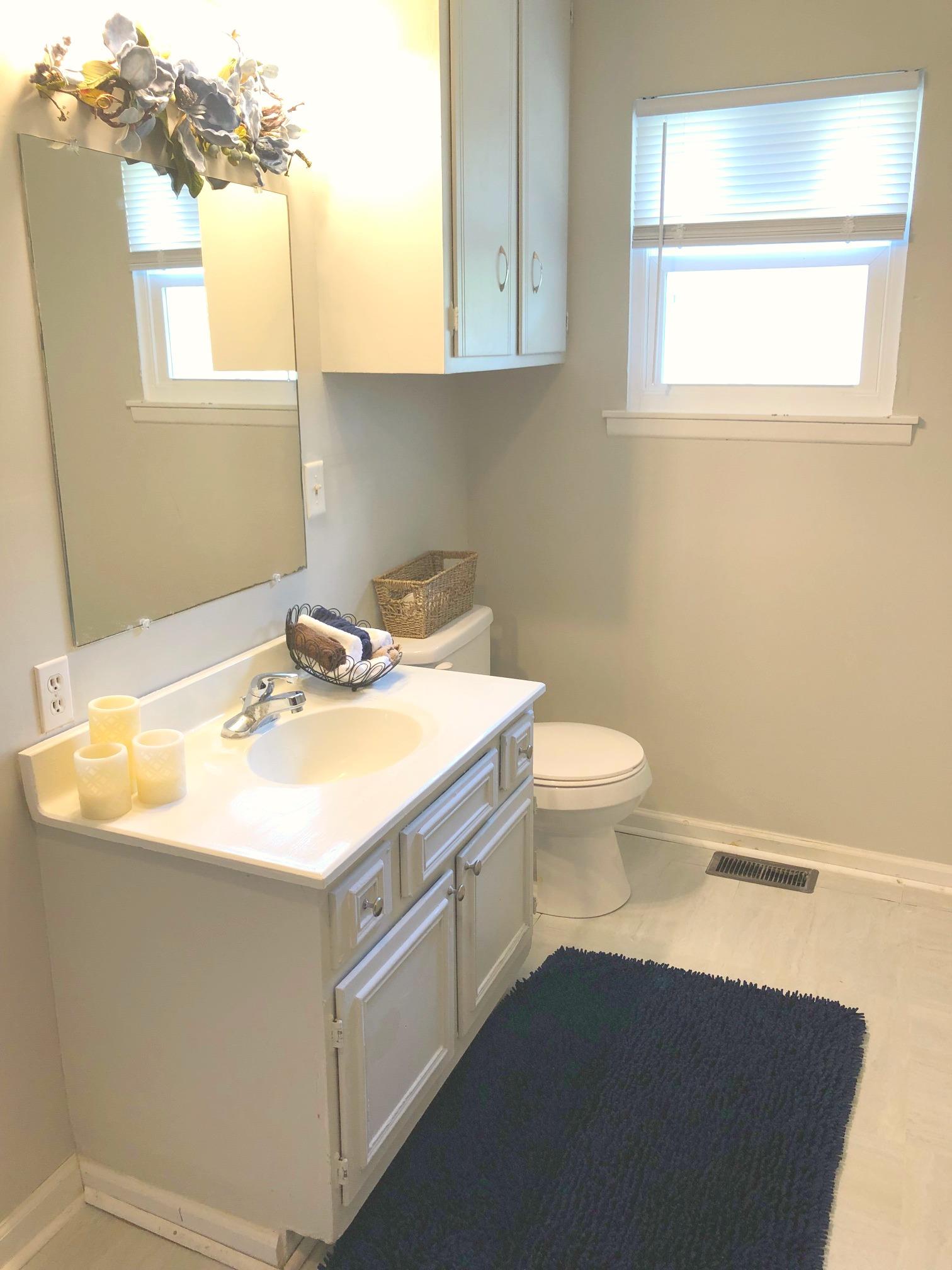 3 Cable Road Oak Grove, KY 42262 - Photo 12 of 17 a bathroom with a sink a toilet and a window