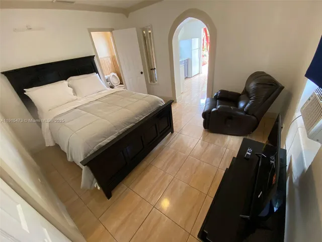 a view of swimming pool with seating space