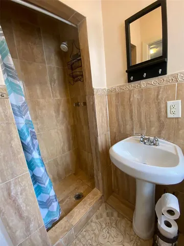 a bathroom with a toilet and a sink