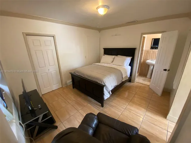 a view of a house with pool porch and furniture