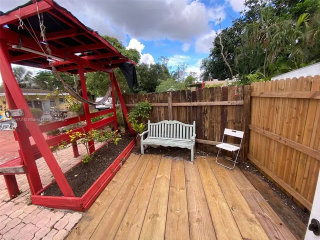 a view of a porch with a door