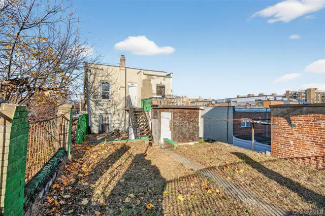 a view of a terrace with wooden floor and city view