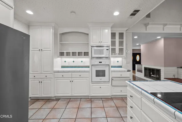 a workspace with furniture and a window