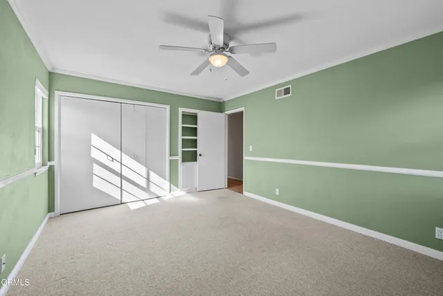 a view of street with large trees