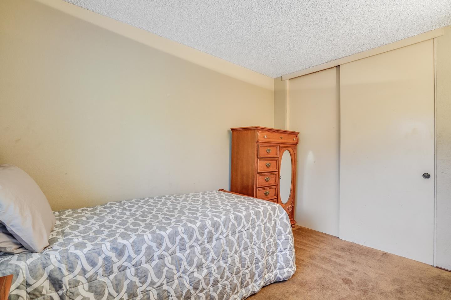 2838 Mantis Drive San Jose, CA 95148 - Photo 36 of 48 a bedroom with a bed and a window