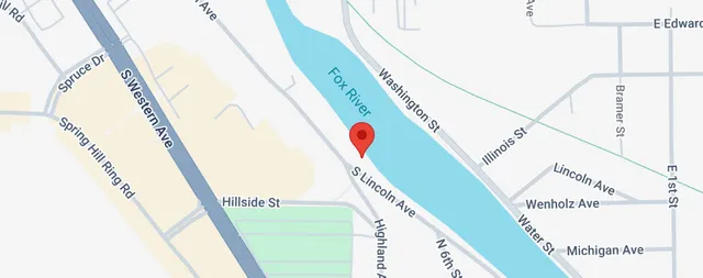 a view of a hallway with white walls