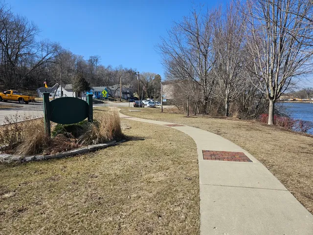 a view of street with with cars