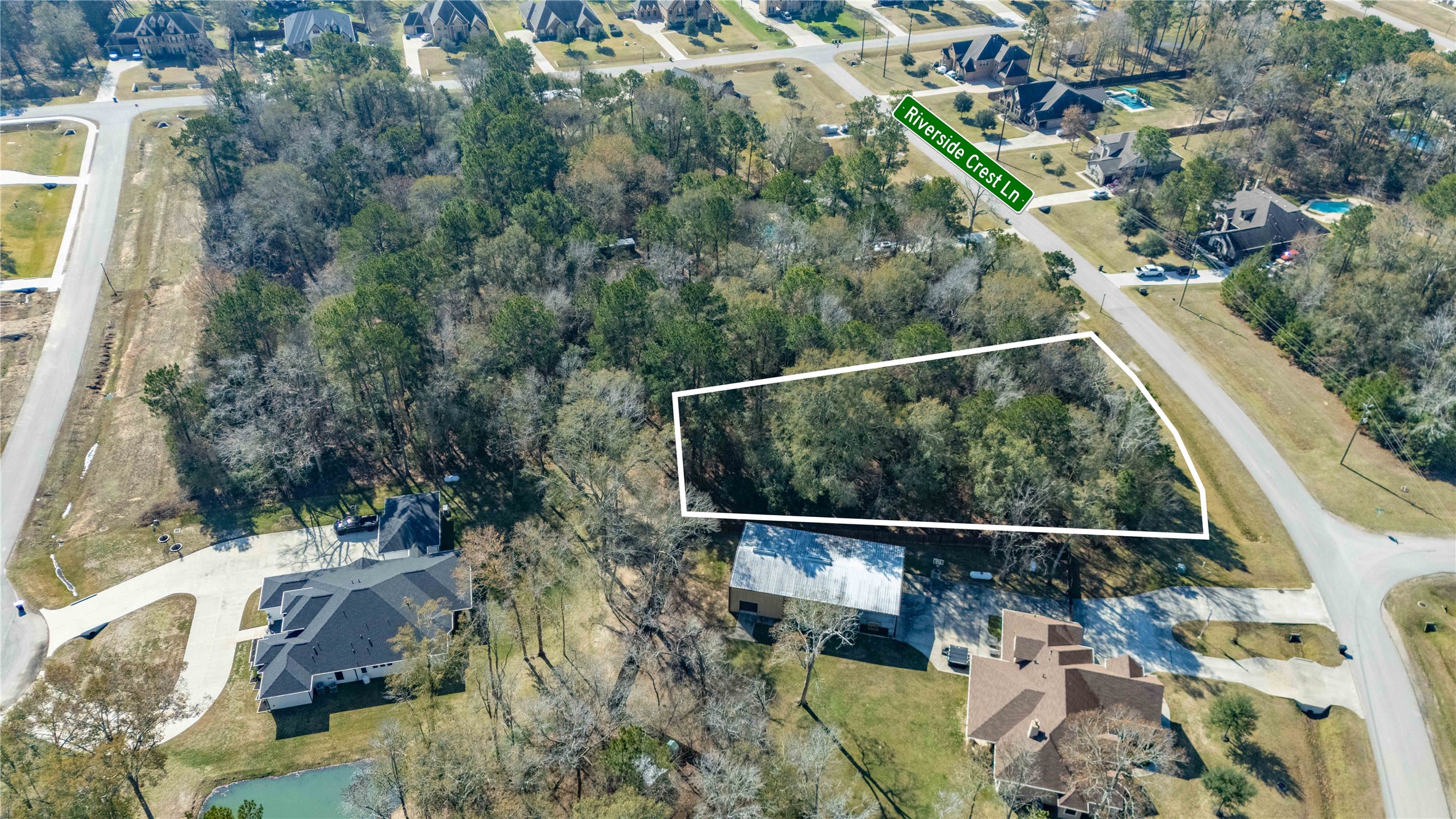 28518 Riverside Crest Lane Huffman, TX 77336 - Photo 4 of 6 a view of a yard