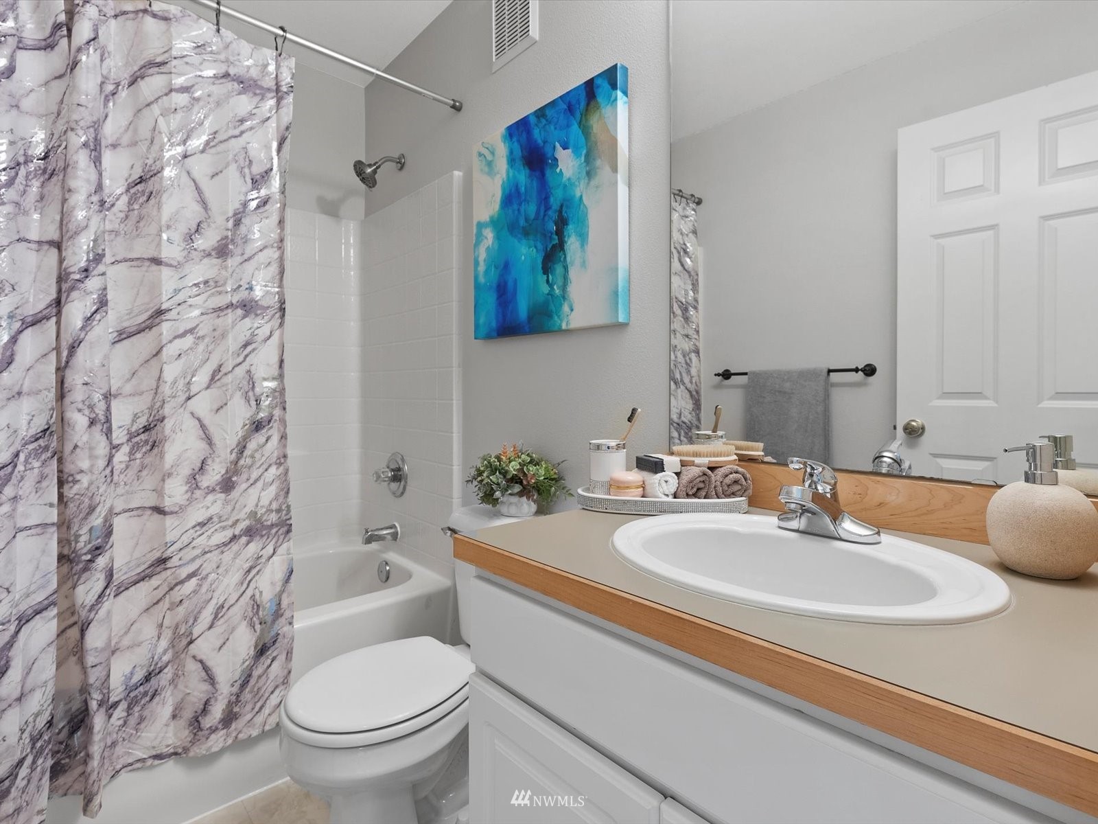 1391 Huckleberry Circle Issaquah, WA 98029 - Photo 22 of 32 a bathroom with a sink toilet and shower