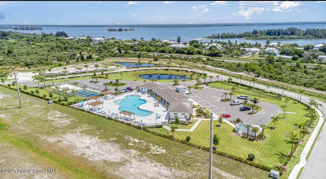 a view of a swimming pool with a garden