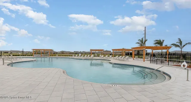 a view of a swimming pool and a terrace