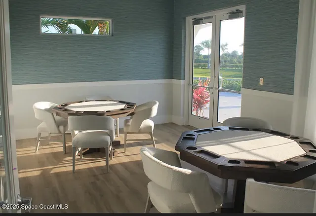 a table and chairs in a balcony