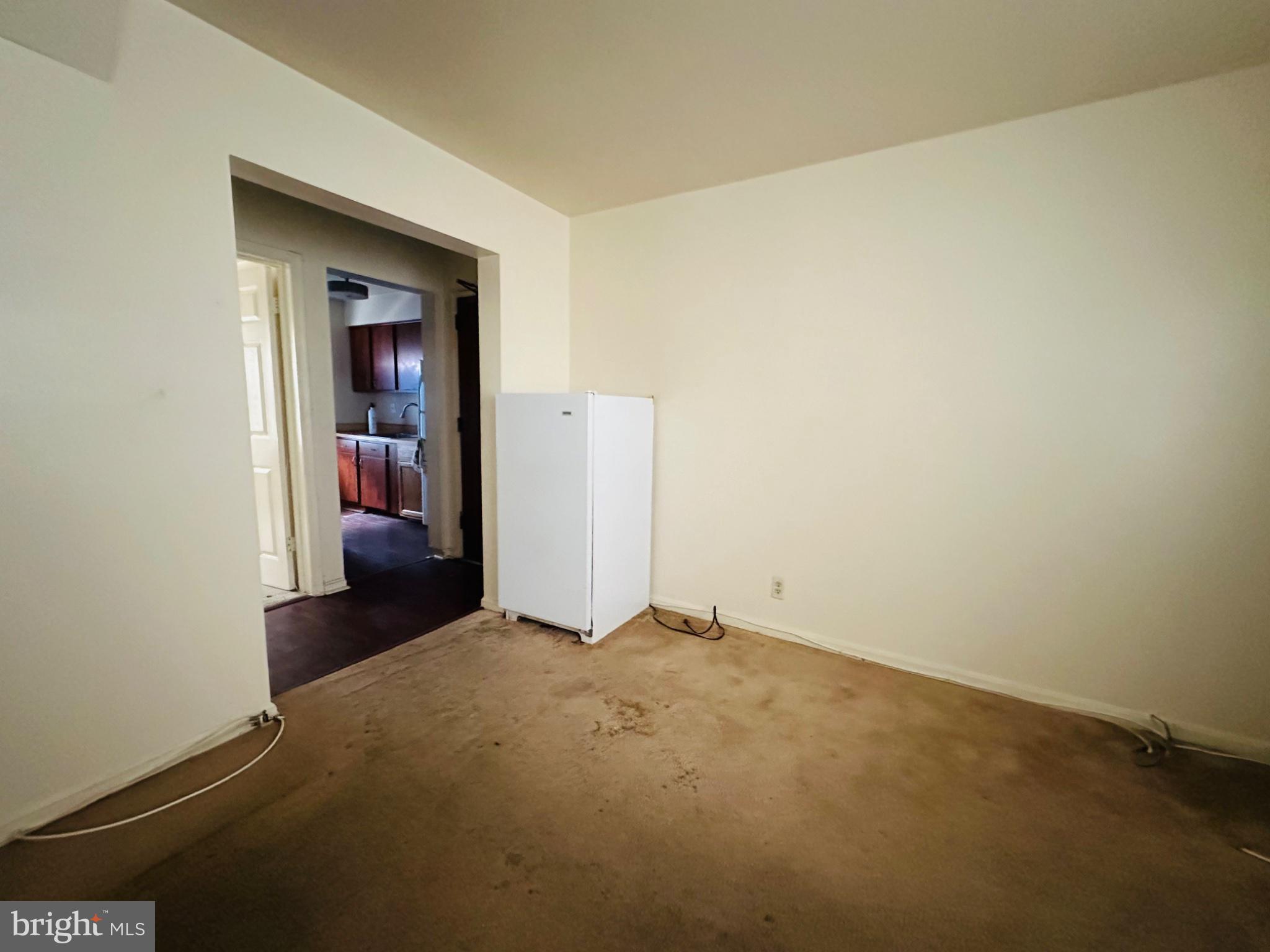 2013 37th Street Southeast Washington, DC 20020 - Photo 2 of 6 Spacious room with potential charm.